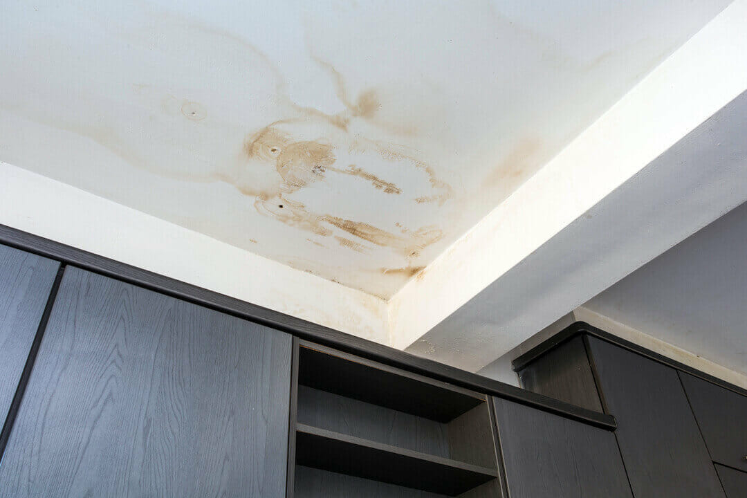 water damage stain on ceiling needing water damage restoration services