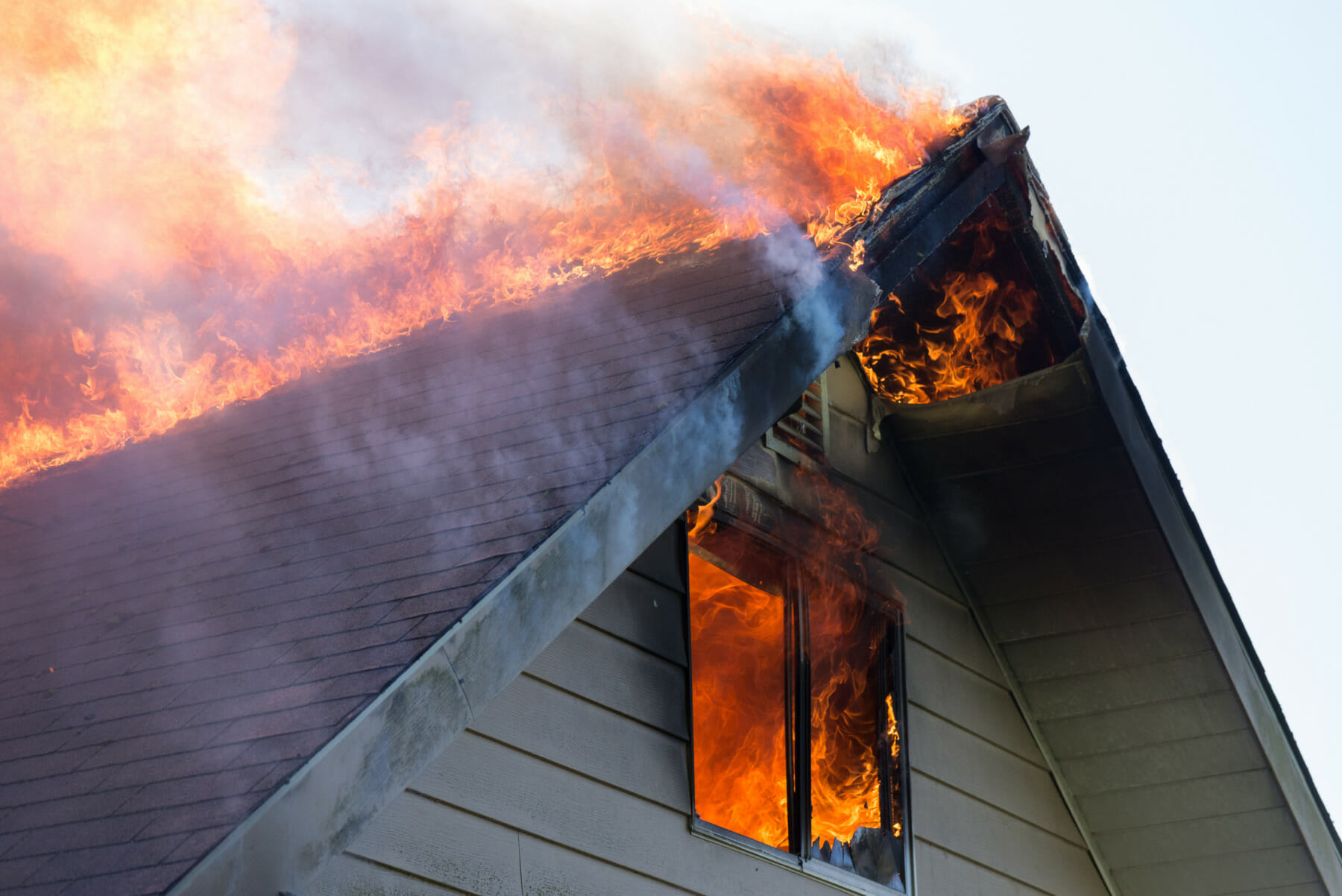 Flames Rolling from Roof & Window of Home | Housefire Risks & Remediation